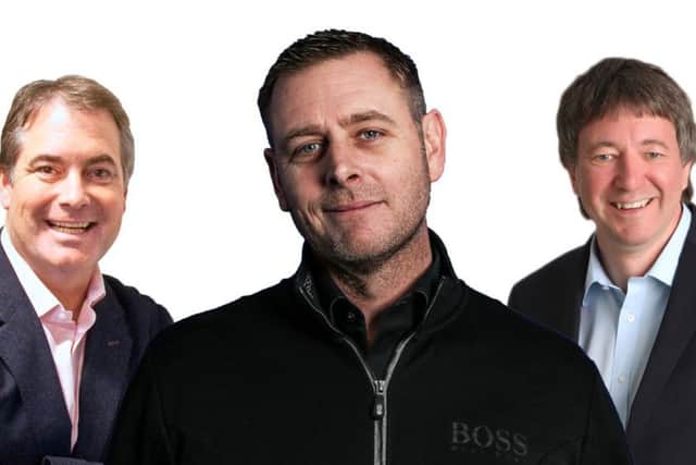 Posh chairman Darragh MacAnthony flanked by his club co-owners Stewart 'Randy' Thompson (left) and Dr Jason Neale.
