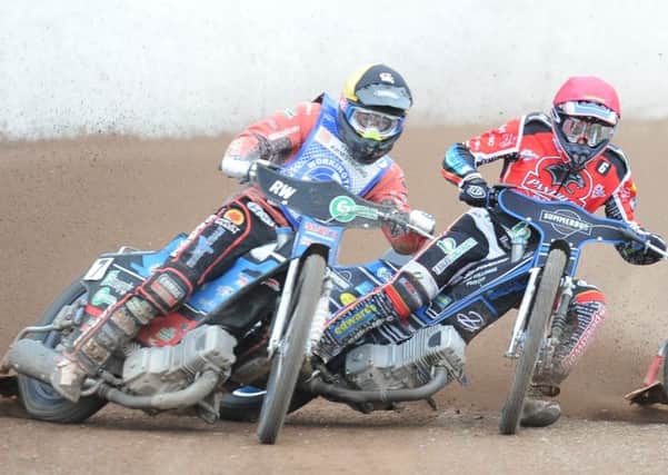 Tom Bacon of Peterborough Panthers (right) in action in the drubbing by Workington. Photo: David Lowndes.