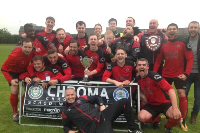 Netherton United celebrate their President's Shield success.
