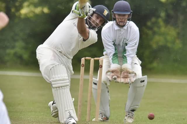 Liam Dave hits out on his way to 42 not out for Stamford against Castor. Photo: David Lowndes.