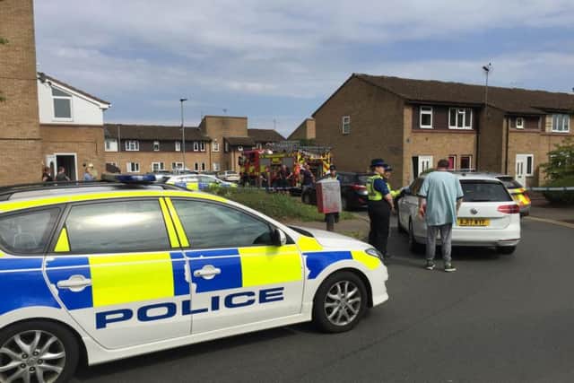 Police have set up a 100m cordon at the scene in Peterborough
