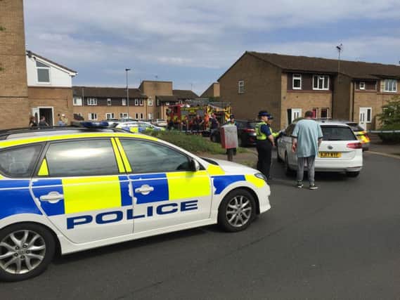 Police have set up a 100m cordon at the scene in Peterborough
