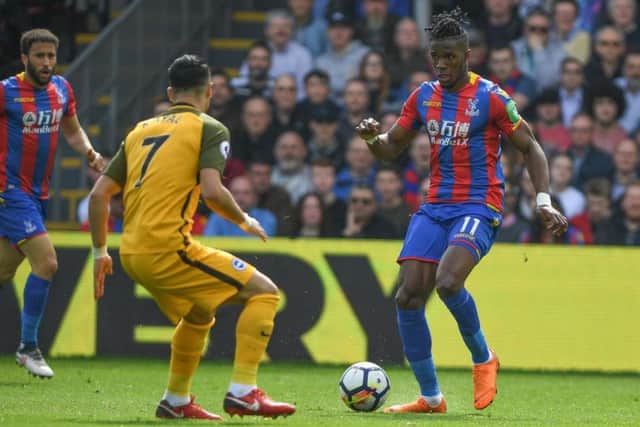 Wilfried Zaha in action for Palace.