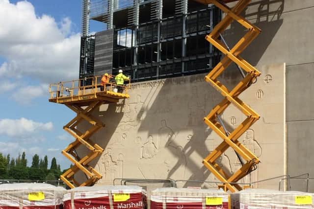 Work on the mural last week at Fletton Quays. Photo provided by the Peterborough Investment Partnership