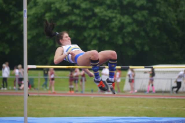 Harriet Fenton-Lake wins the high jump at the Cambs County Championships.