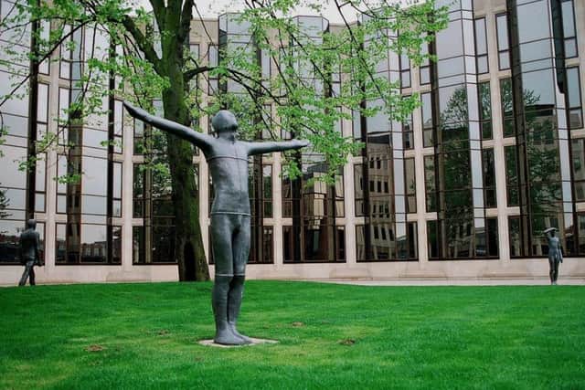 The Gormley statues in Touthill Place in the 1980s, photographed by Chris Porsz.