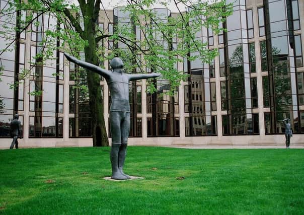 The Gormley statues in Touthill Place in the 1980s, photographed by Chris Porsz.