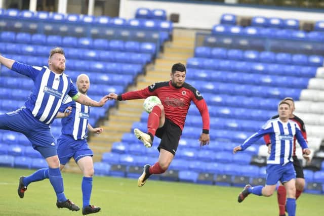 Netherton United striker Ondre Odain just failed to connect with this cross in the PFA Senior Cup final win over Moulton Harrox. Photo: David Lowndes,