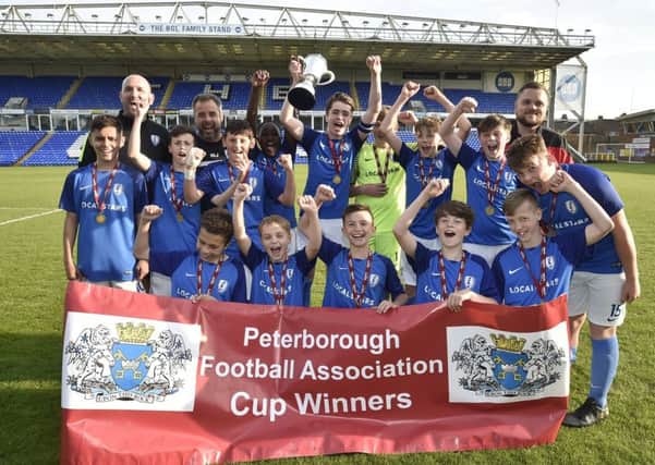 Feeder Soccer celebrate their PFA Under 13 Cup final win. Photo: David Lowndes.