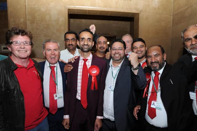 Shaz Nawaz (front, middle). To his right are Richard Ferris and Ed Murphy