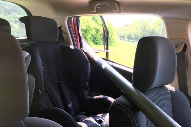 The railing pierced the cabin of the Renault.