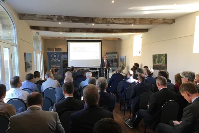Councillor Matthew Lee addresses the inaugural business breakfast for InvestSK at the Eastern Walled Gardens.