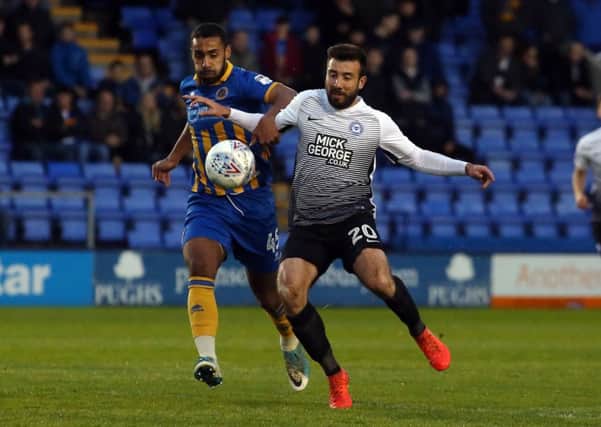 Michael Doughty in action for Posh.