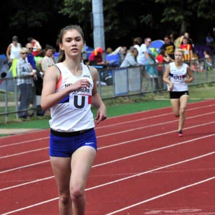 Kelsi Ellis won the triple jump.