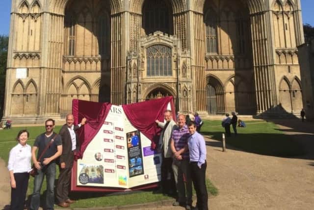From left: Liz Hurst,  Communications Manager at Peterborough Cathedral; Mark Wilson, publisher of The Moment: Richard Astle, Managing Director of Athene Communications; The Very Revd Chris Dalliston, Dean of Peterborough; Neil Gavin; Pep Cipriano, Marketing Manager, Peterborough City Council.