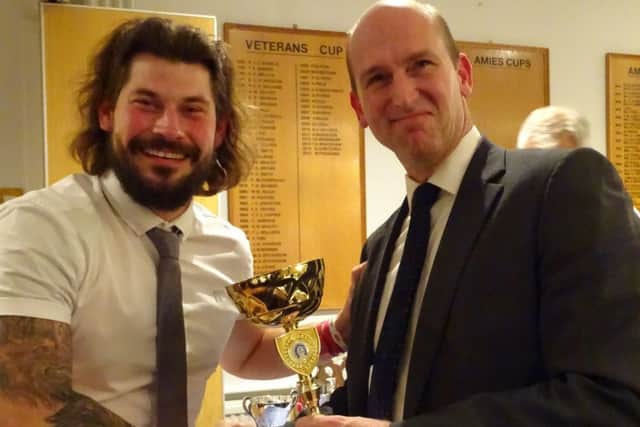 Rob Vitas celebrates a first-half centiry for three years in a Leicestershire League match.