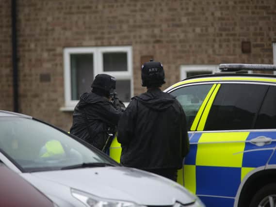 Armed police at the scene in Bretton this morning.