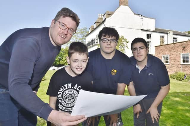 Park House School, Thorney business manager  Luke Rich with pupils Kieron Venters La Freniere,  Riucardo Dias and Joshua Beattie who have  looking at the fundraising plans for a sensory integration area at the school. EMN-180521-122751009
