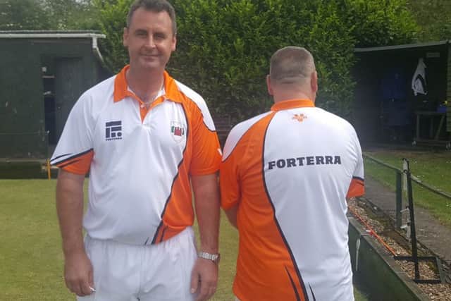 Paul Dalliday (left) and Steve Roden show the front and back design of the new Forterra sponsored shirts. This season is the first where a sponsors name is allowed on the back of a shirt, a move instigated by the county which won approval at last years English Bowling Federation annual meeting.