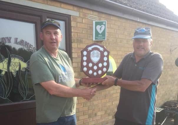 Match organiser Dale Stones (right)  presents the Martin Howard