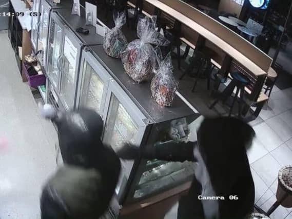 CCTV from the knifepoint robbery at Starbucks