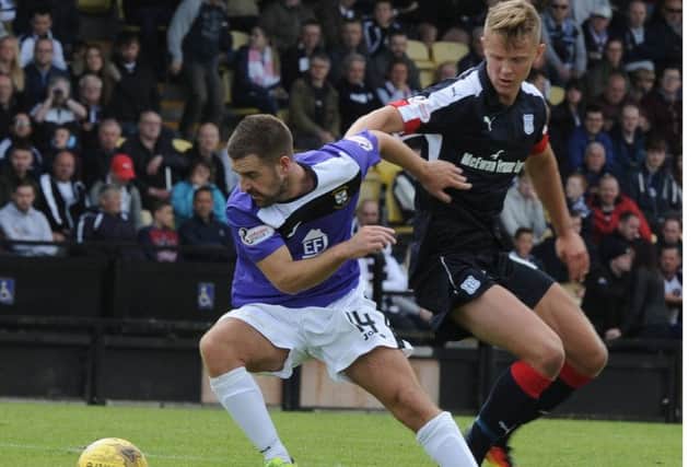 Mark O'Hara (right) in action for Dundee.
