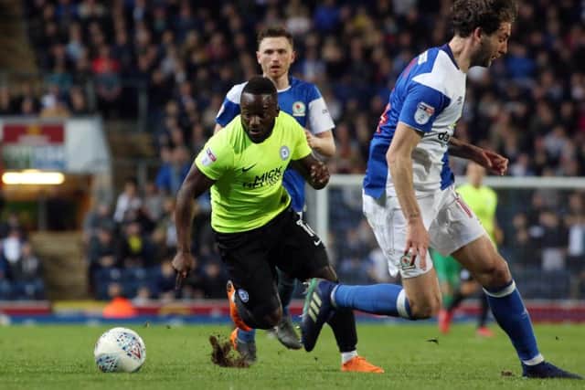 Junior Morias in action for Posh.