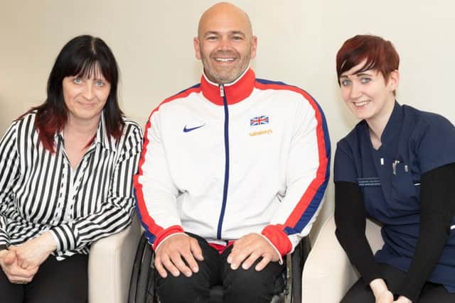 Daniel Nobbs with Optimax (Peterborough) clinic manager Tina Holroyd (left) and Siobhan Holroyd.