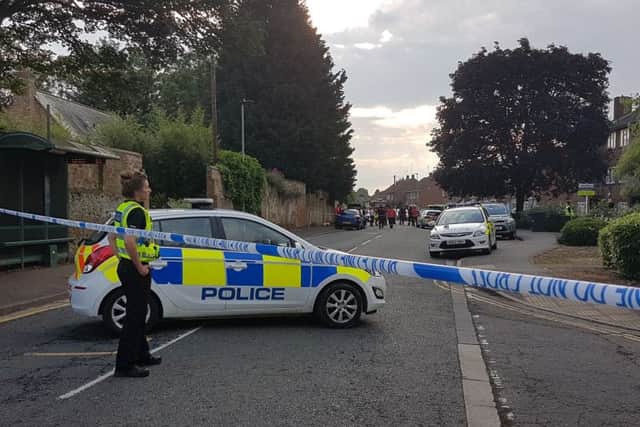 Police at the scene. Photo: Mark Kirk