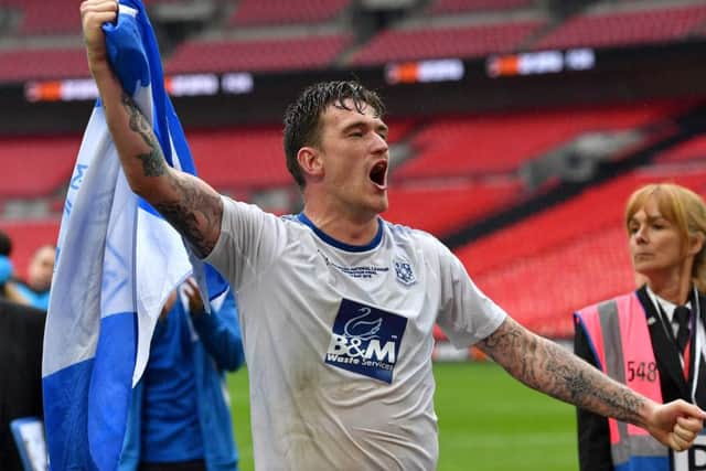 Andy Cook has joined Walsall from Tranmere.