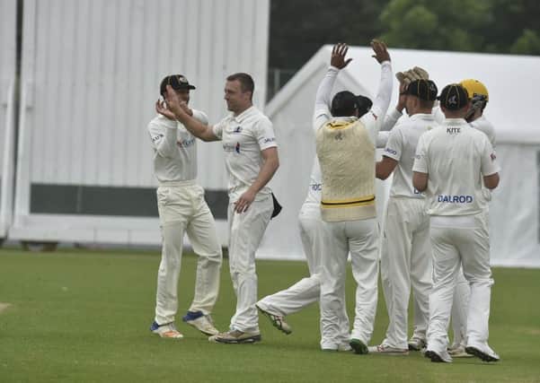 Peterborough Town celebrate a wicket in last week's easy win over Brixworth.