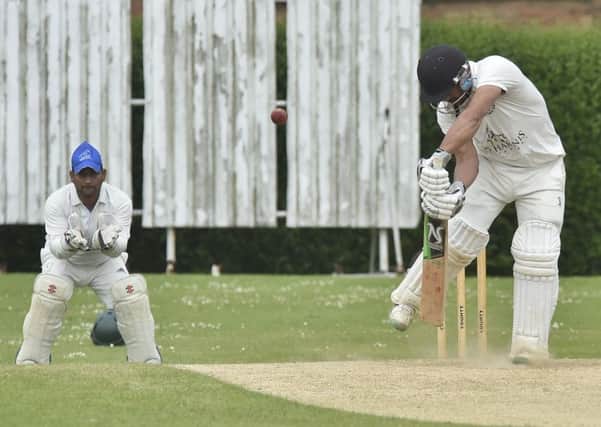 Asim Butt finished 69 not out for Peterborough Town at Brigstock.