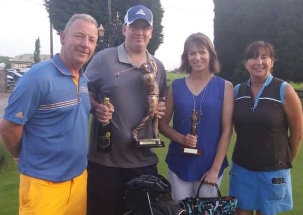 Nick (left) and Kim Markillie (right) are pictured with the mens and ladies winners Lewis Field and Lynn Exley at the Daniel Markillie Memorial Day.