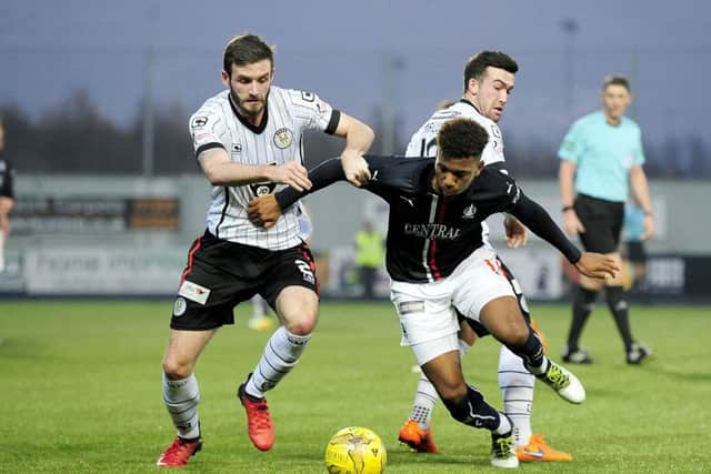Jason Naismith (left) in action for Ross County.