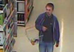 CCTV of a man police wish to speak to