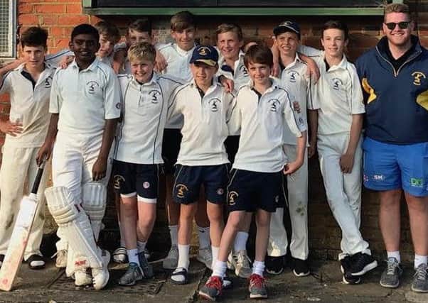 Hunts Under 13s with coach Lee Smith after their first win of the season.