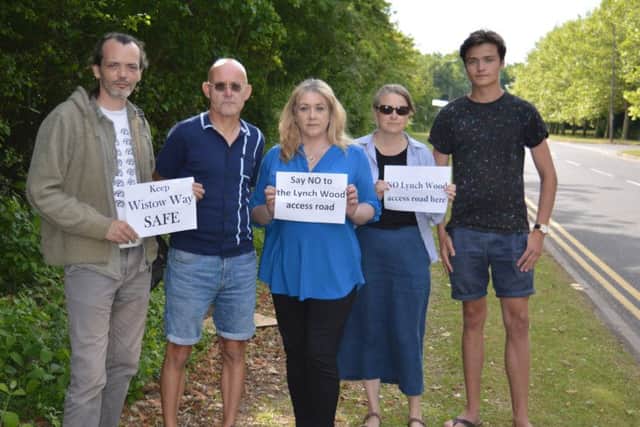 Protesting, Councillor Julie Howell, centre, with concerned residents.