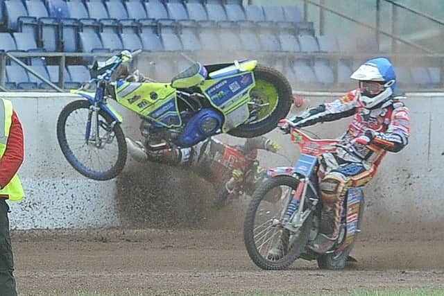 Ulrich Ostergaard is catapulted into the fence during Panthers win over Ipswich. Photo: David Lowndes.