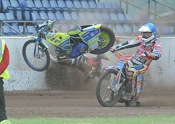 Ulrich Ostergaard is catapulted into the fence during Panthers win over Ipswich. Photo: David Lowndes.