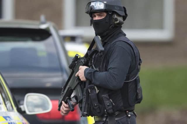Armed police in Peterborough