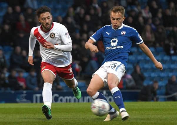 New Posh signing Louis Reed (right) in action for Chesterfield last season.