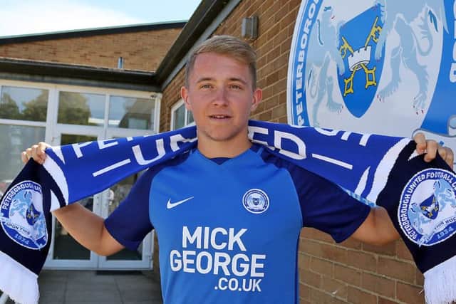 Louis Reed after signing for Posh. Photo: Joe Dent/theposh.com.