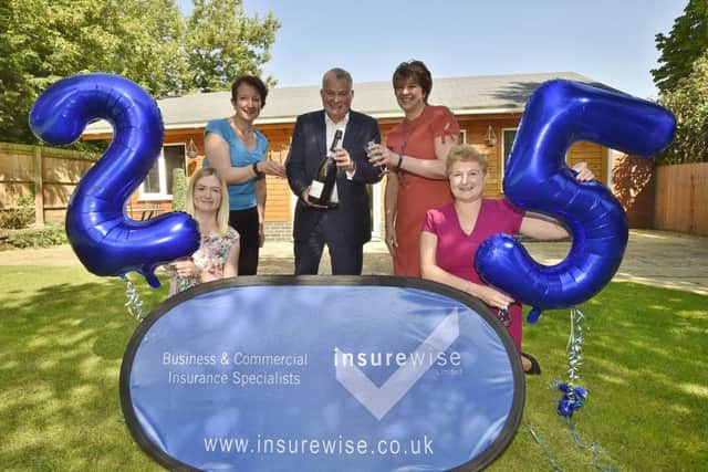 Neil McCulloch MD celebrates 25th anniversary of Insurewise at Werrington with staff Vicky Davis, Sarah Willis, Mandy Kisbee   and Jackie Hall. EMN-181206-130407009
