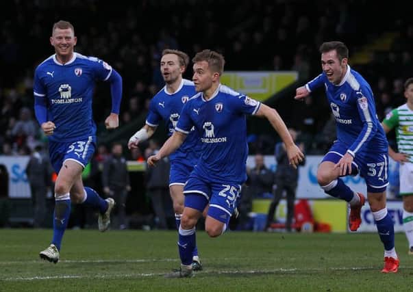 Louis Reed celebrates a goal for Chesterfield. Photo: Howard Roe/AHPIX.com.