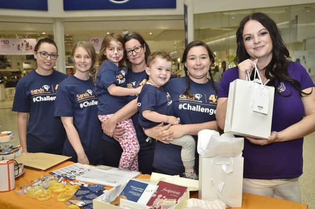 Jade Baxter, Amy Eagling, Sally Boylan, Martha McCann (6), Lucy MacRae, Oliver Convelly (2) from Sands and Emma Fordham from The Comfort Mummy Foundation.