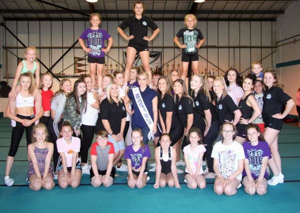 The East Elite Allstars at their new gym with Miss Peterborough Laura Bailey