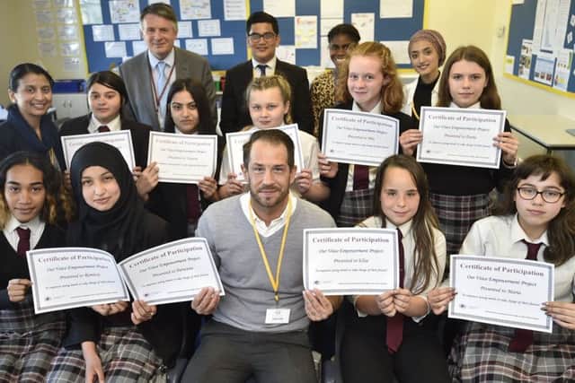 Guest speaker, former Kettering Town footballer Arvey Betts from Arkflux with  Girl Empoweerment students at St John Fisher RC School.
