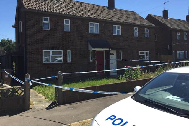 The police cordon remains in place in Viney Close in Peterborough.