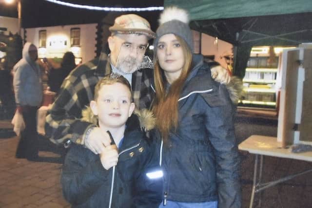 Megan Hall, who passed away recently, with her dad Ronnie and her son Luke EMN-180625-173408009