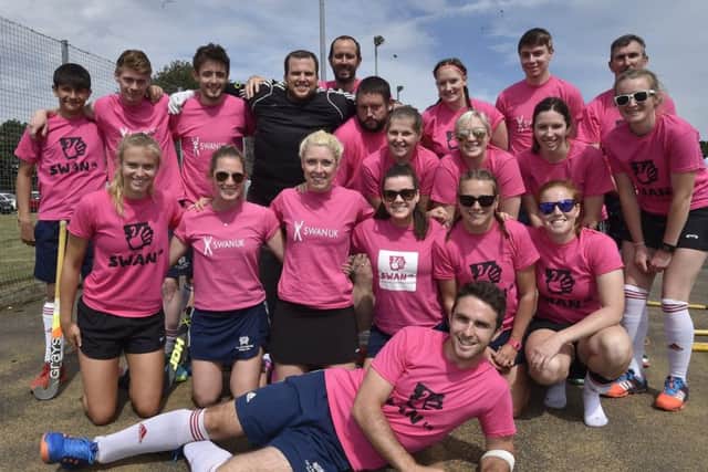 The winning Pink Swans team.